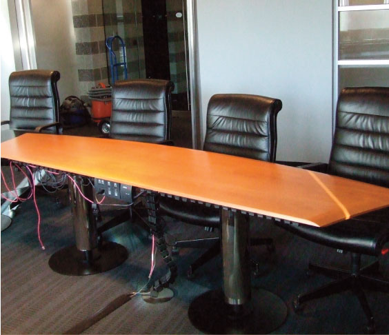 Billings Woodworking and the refinished conference table