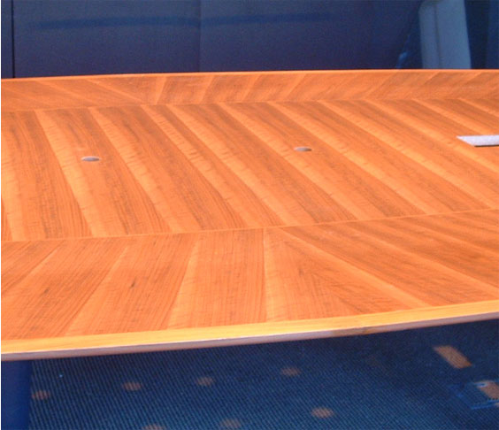 Billings Woodworking completes the resizing of the conference table
