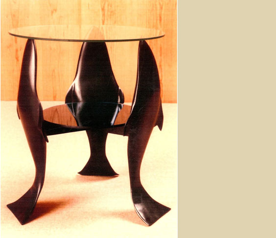 This Fish Table by Scott Billings features three identical hand-carved fish