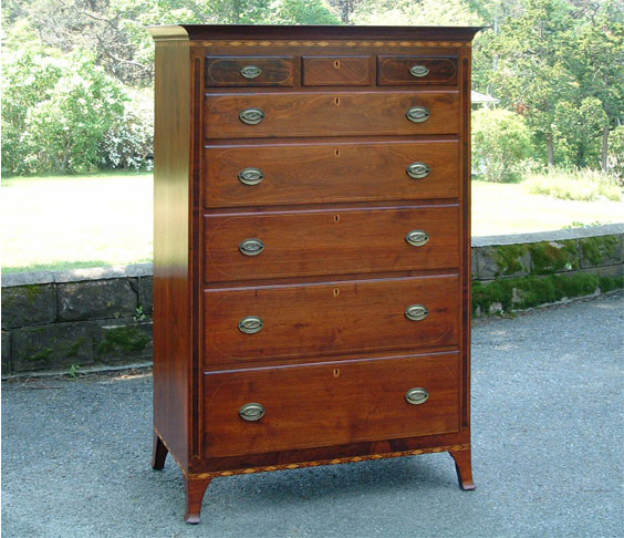 This bureau was refinished by Billings Woodworking offiste at his workshop